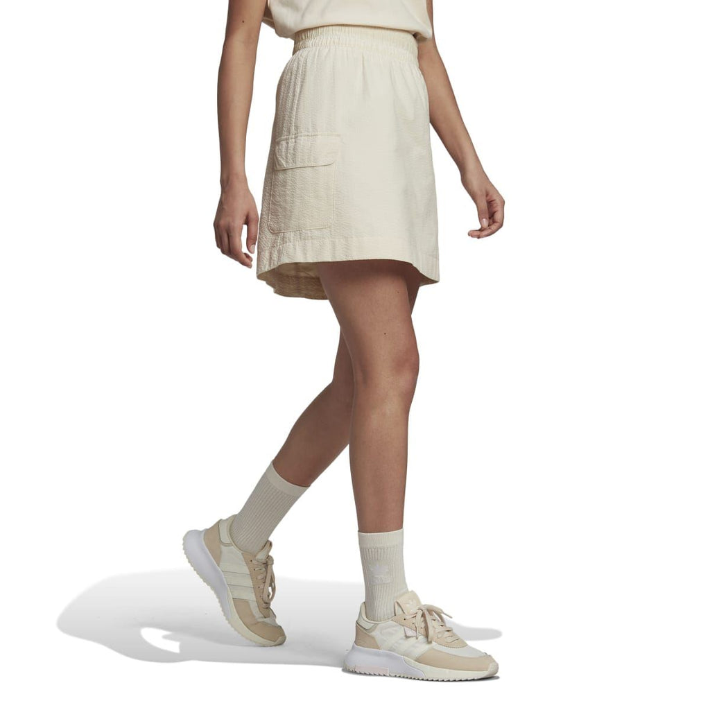 adidas Originals Adicolor Classics poplin skirt featuring a high waist and pleated design, lightweight fabric, and stylish casual fit
