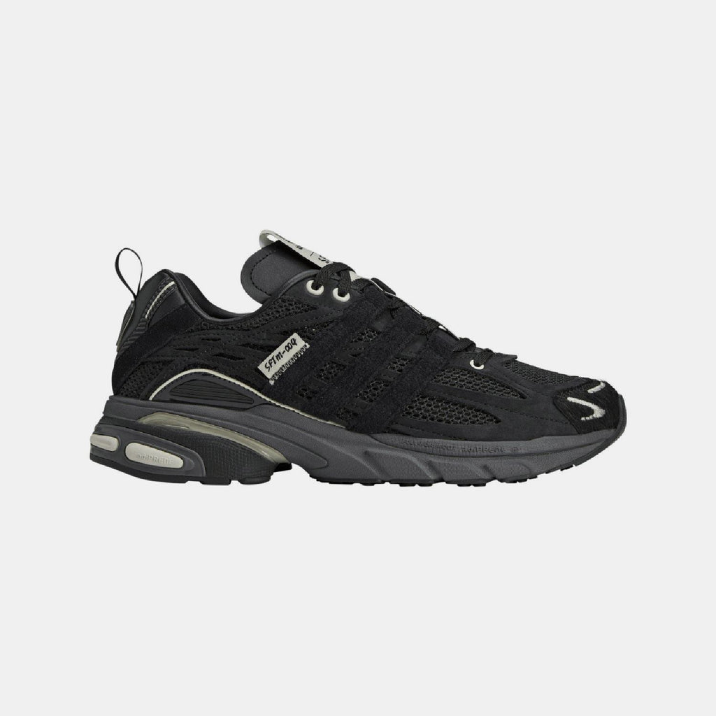 adidas Originals Adistar Cushion STFM trainers showing white and black athletic footwear with cushioned soles and stylish design