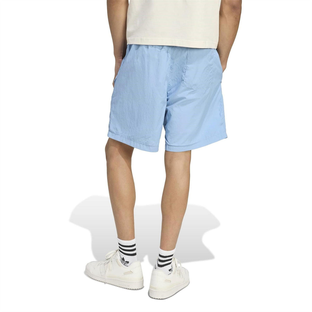 Light blue adidas Originals shorts with straight hem and small adidas logo detail