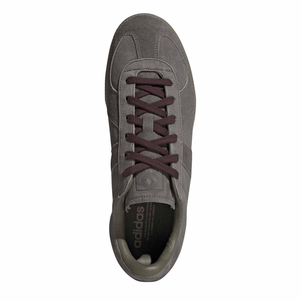adidas Originals low-top sneakers in dark gray with lace-up front and gum trim sole