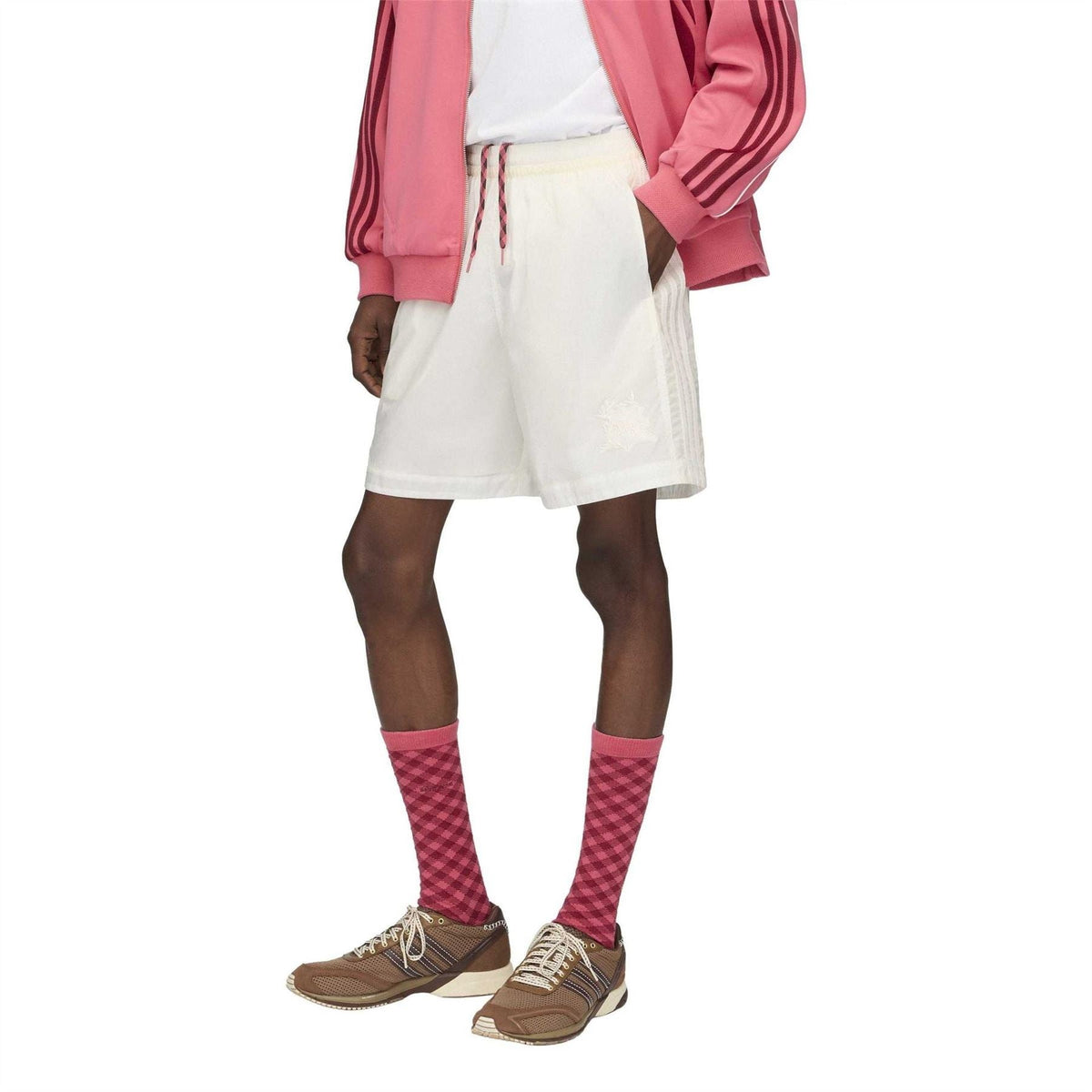 Off-white football shorts with straight hem and stitched side panels
