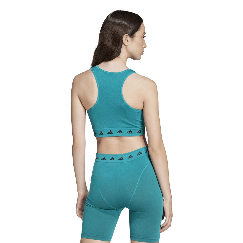 Teal racerback cropped tank with adidas branding and patterned hem band; back view