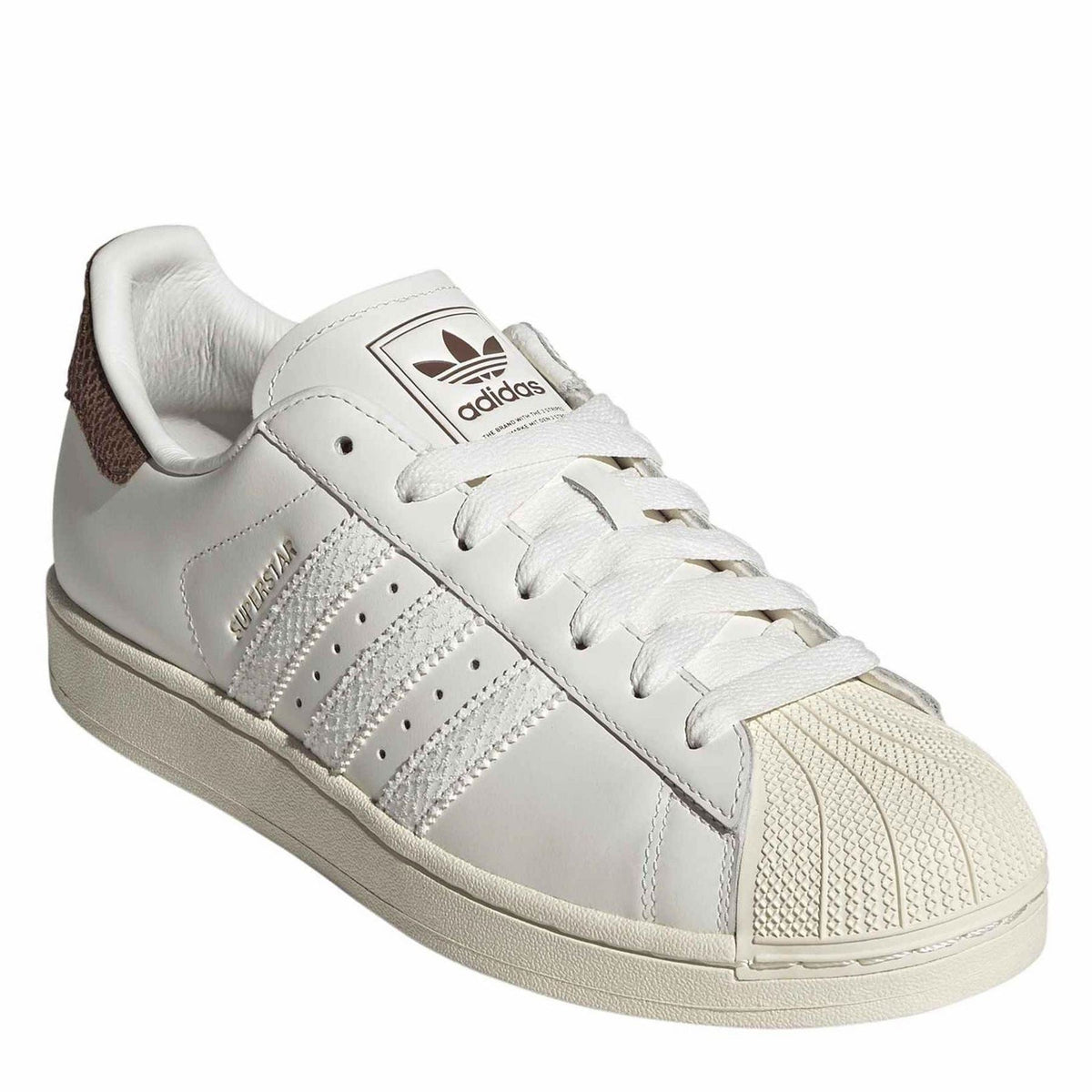 White adidas Superstar II low-top sneaker with brown suede heel panel and lace-up eyelets.