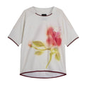 White football jersey with watercolor floral print and burgundy trim at collar and hem