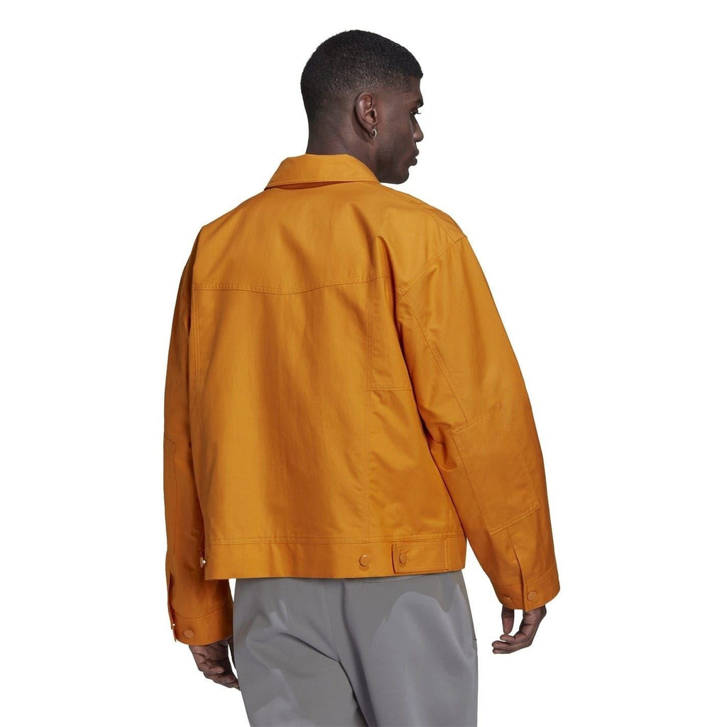 adidas Originals Tie Break jacket, a stylish coat with sporty design, lightweight fabric, and classic branding visible in the image