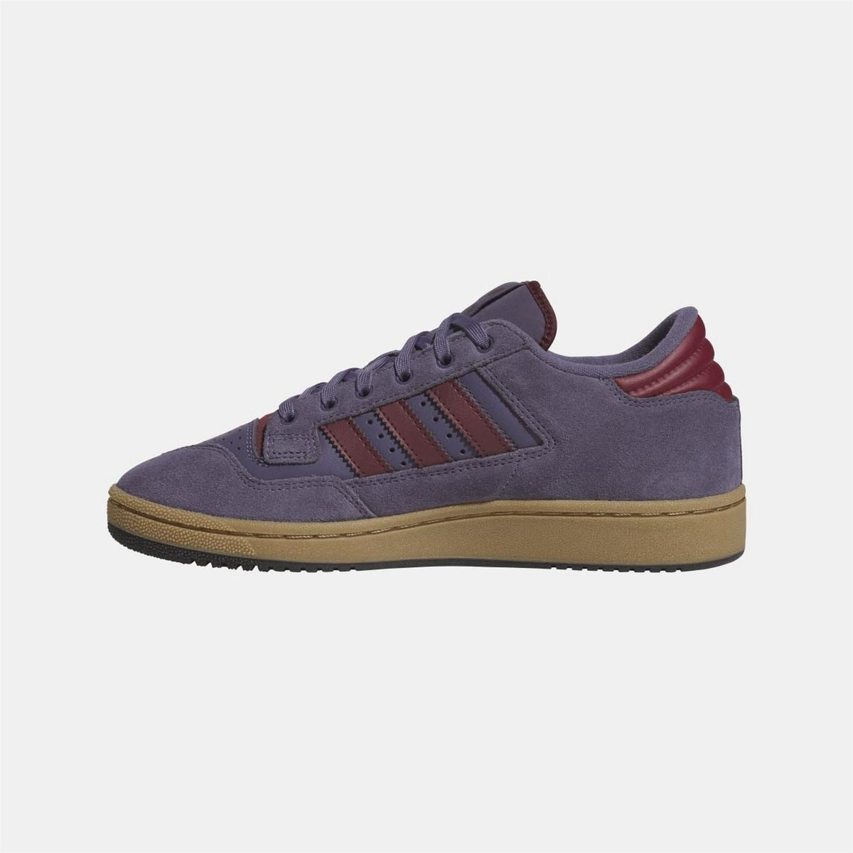 adidas Originals 85 Low ADV sneakers in black and white, showcasing classic low-top footwear with stylish design details