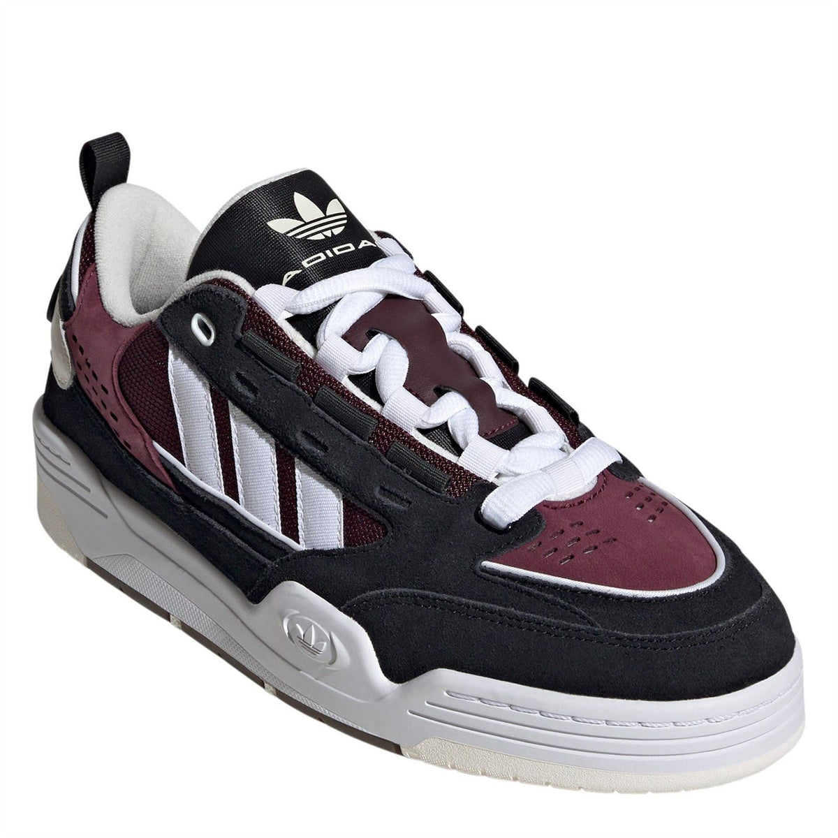 adidas Originals Adi2000 men's low-top trainers in black with white accents, featuring a classic athletic sneaker design.
