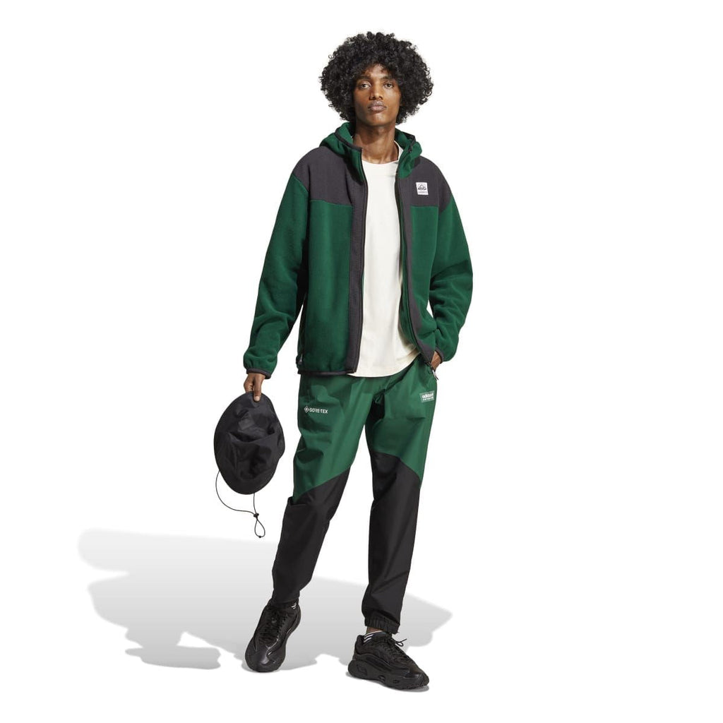 adidas zip hoodie with hood, green and charcoal color-block on model