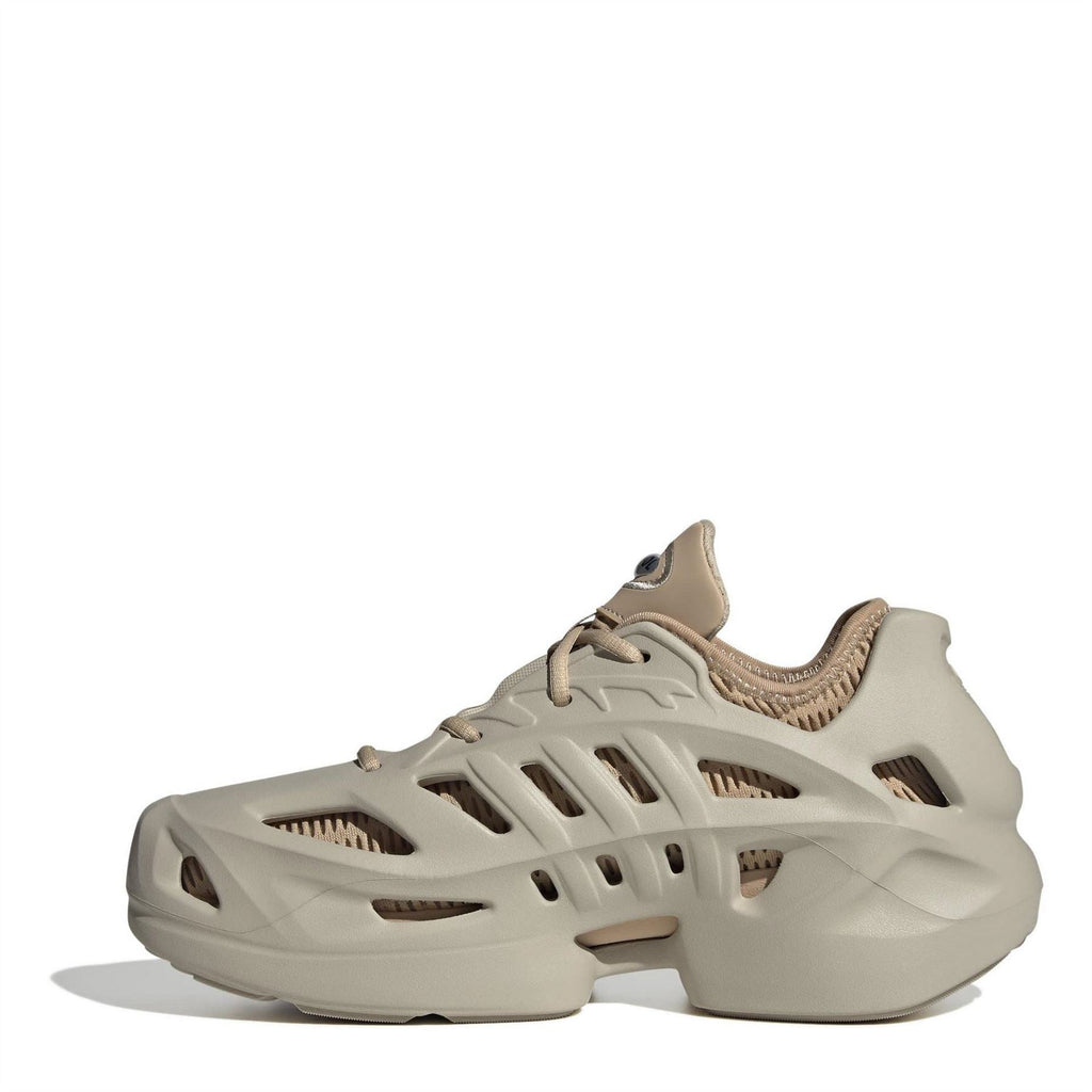 Beige adidas Adifom low-top sneakers, angled side view with cutout detailing