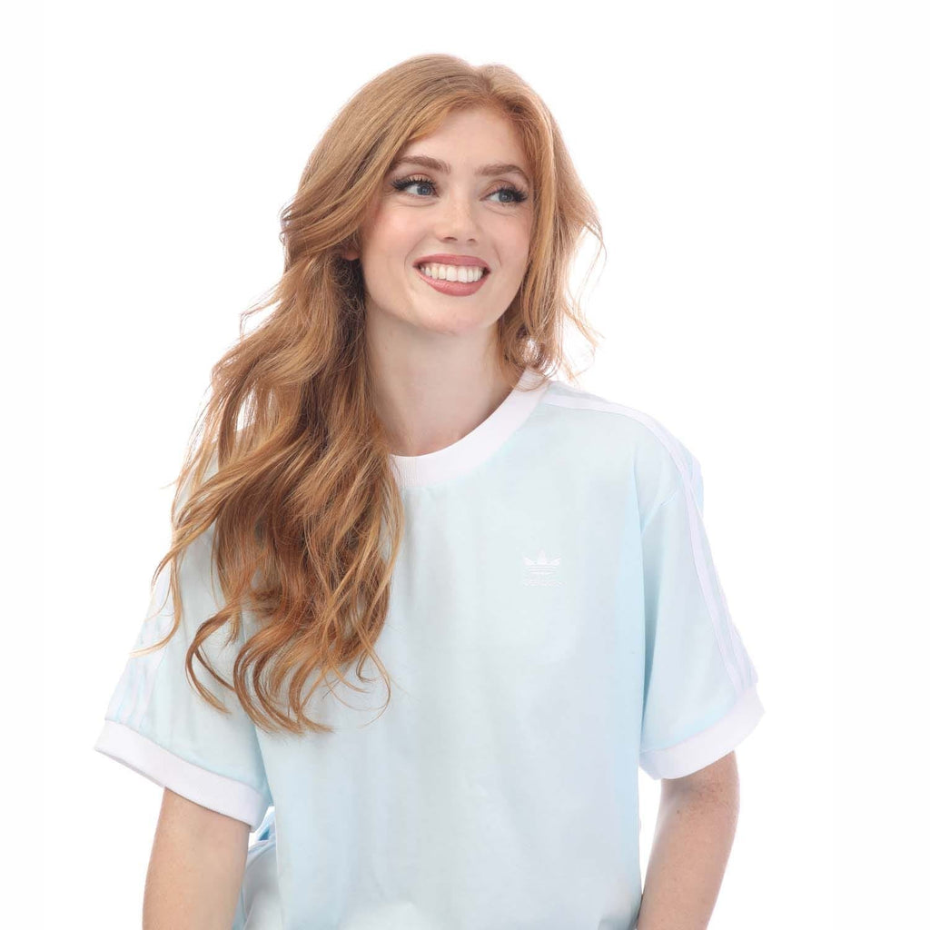 Light blue crew-neck T-shirt with small chest logo, short sleeves, plus size