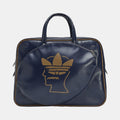 Navy duffel bag with top handles, gold logo front and zippered sides