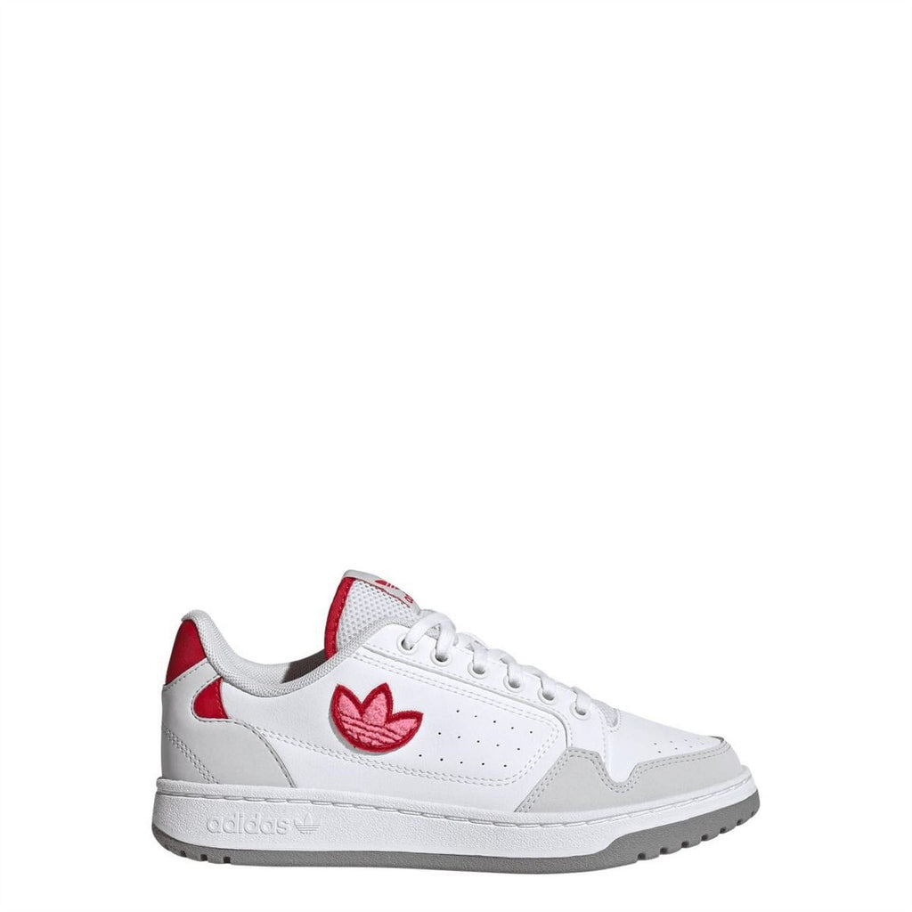 White low-top trainers with red side panel and butterfly logo; lace-up with rubber sole