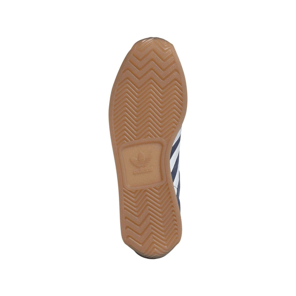 Rubber outsole with zigzag tread and adidas logo on heel
