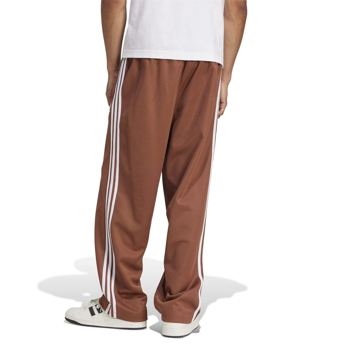 Brown straight track pants with elastic waist, white triple stripes, cuffed hems