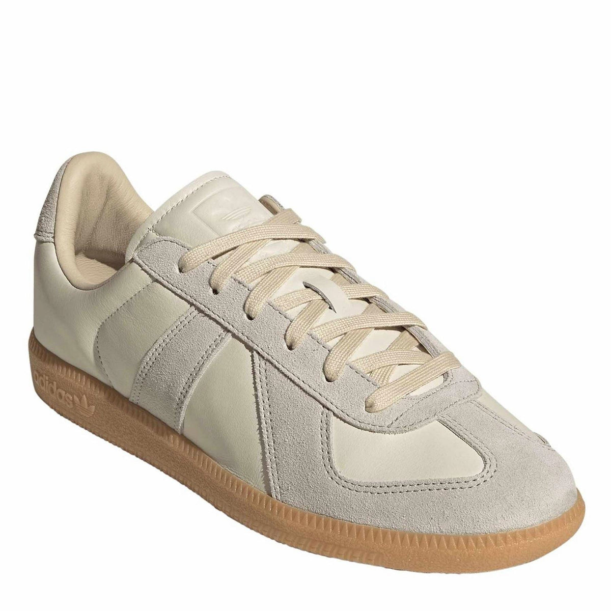 Cream and gray suede-look adidas sneakers with lace-up and gum rubber sole