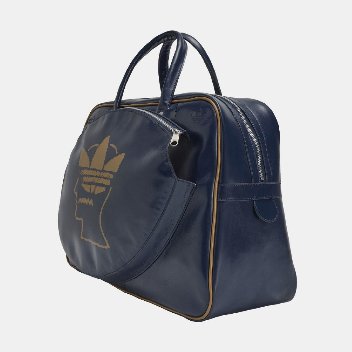 Navy duffel bag angled view with top handle, side zipper, and gold Trefoil head logo.