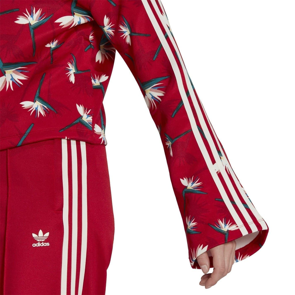 Red cropped top sleeve with white triple stripes and floral print
