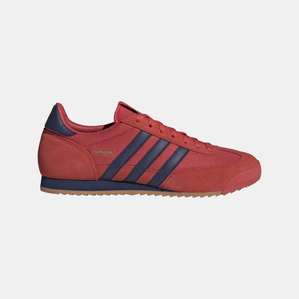 adidas Originals R71 shoes in white with black accents, showcasing classic low-top footwear with sleek design and comfortable fit