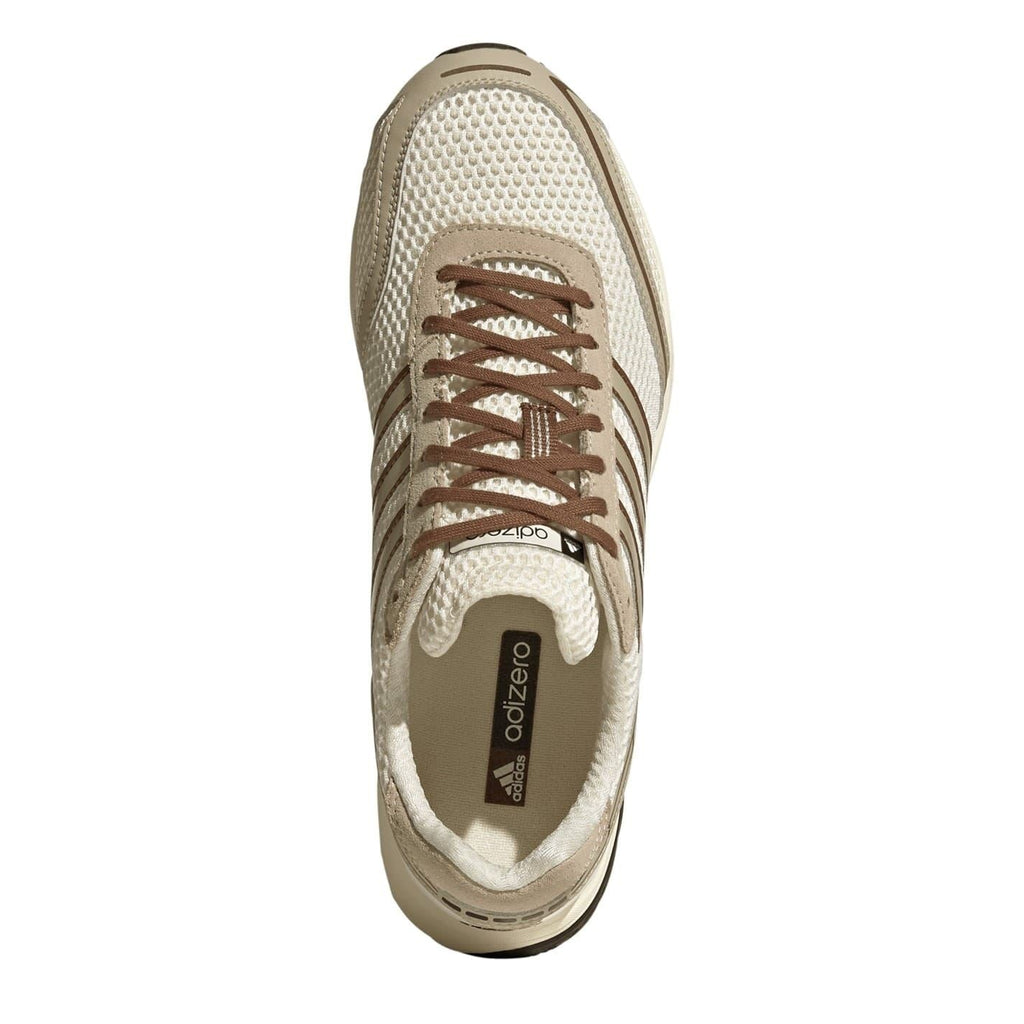 Off-white adidas Adizero trainers side view with brown lace-up and textured mesh
