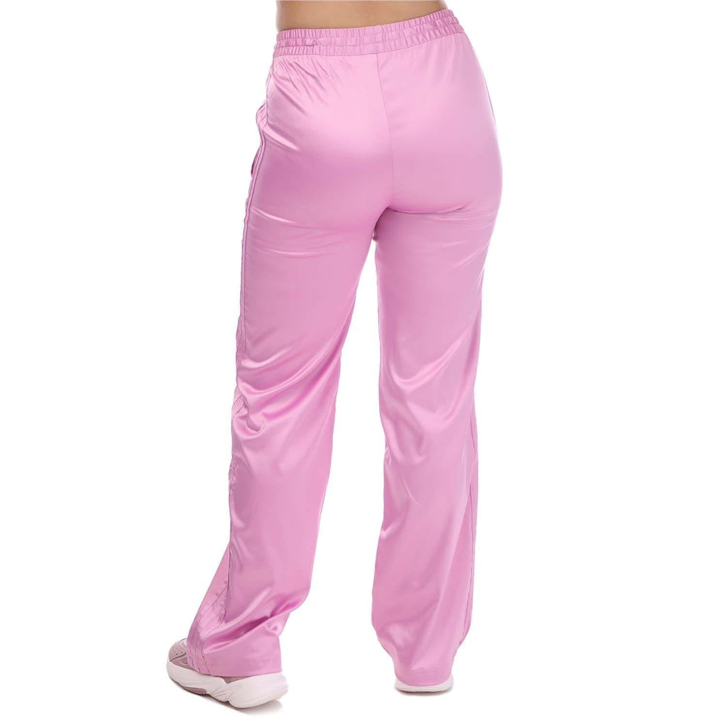 Pink wide-leg jogger pants with elastic waistband and draped legs
