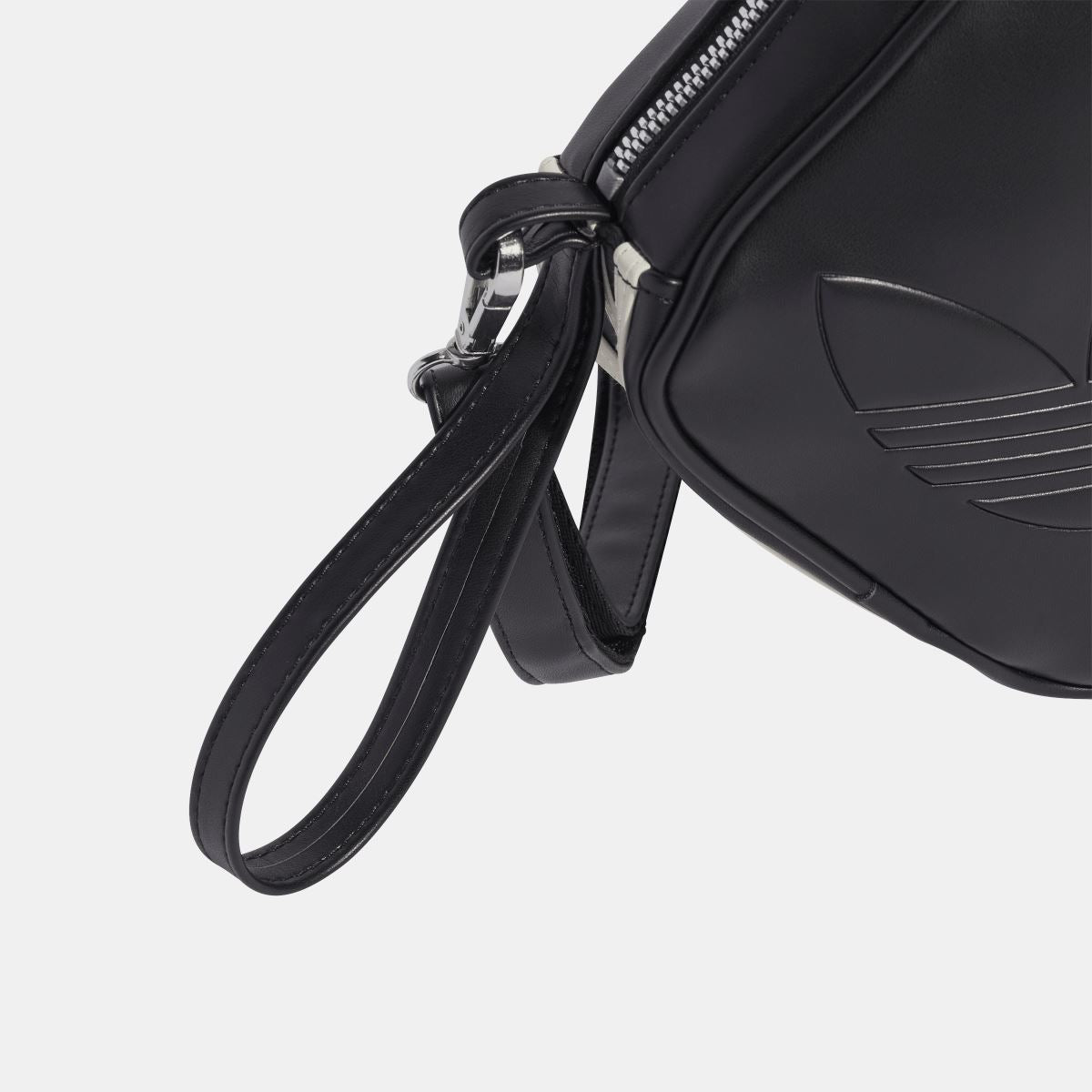 Men's adidas Originals diamond-shaped bag with adjustable strap and sleek design, perfect for casual everyday use.
