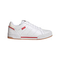 White low-top trainers with red stripe and gum rubber sole