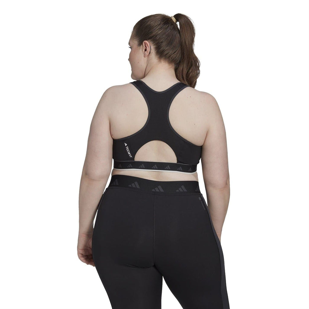 Black racerback sports bra top with open back and Adidas logo