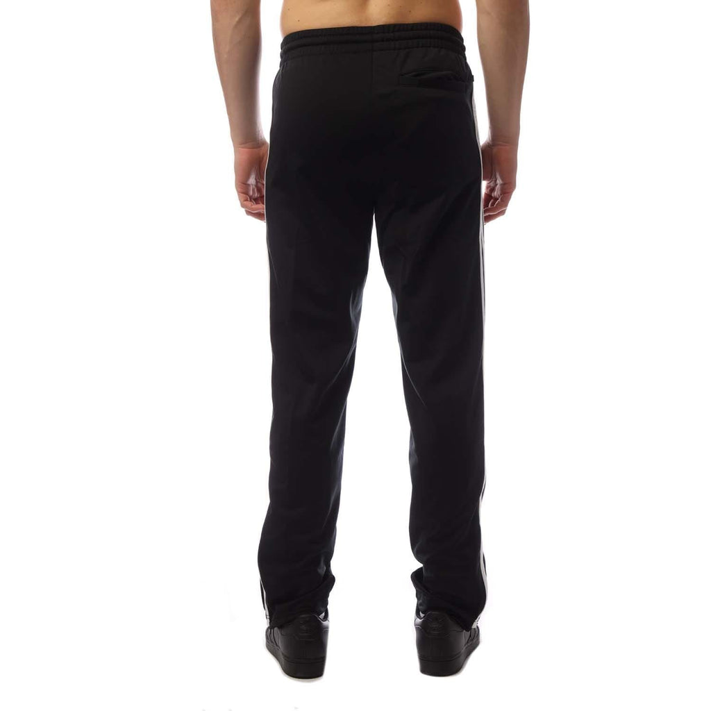 Black track pants with elastic waistband and relaxed straight-leg fit