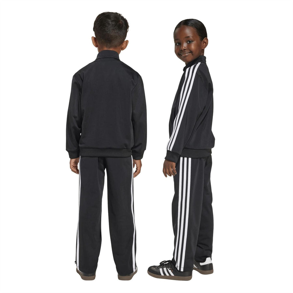 Kids adidas Firebird tracksuit, back view, black with white stripes on zip jacket and pants