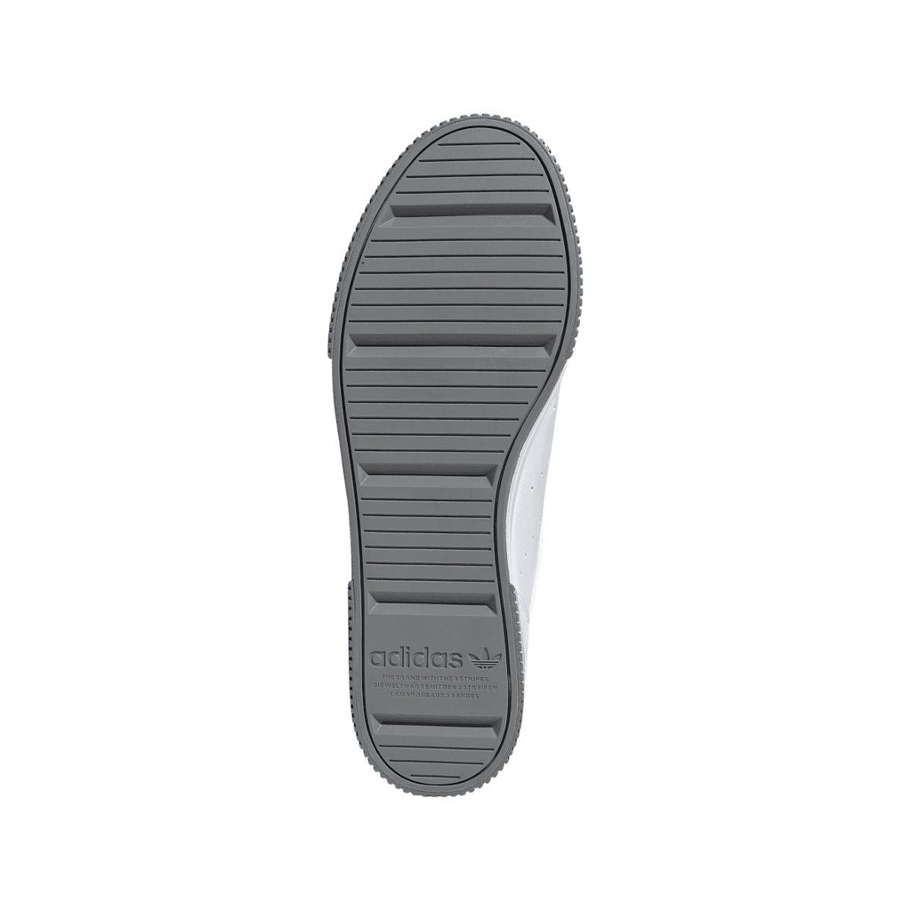 Rubber outsole for white adidas Originals trainers with ridged tread and adidas logo