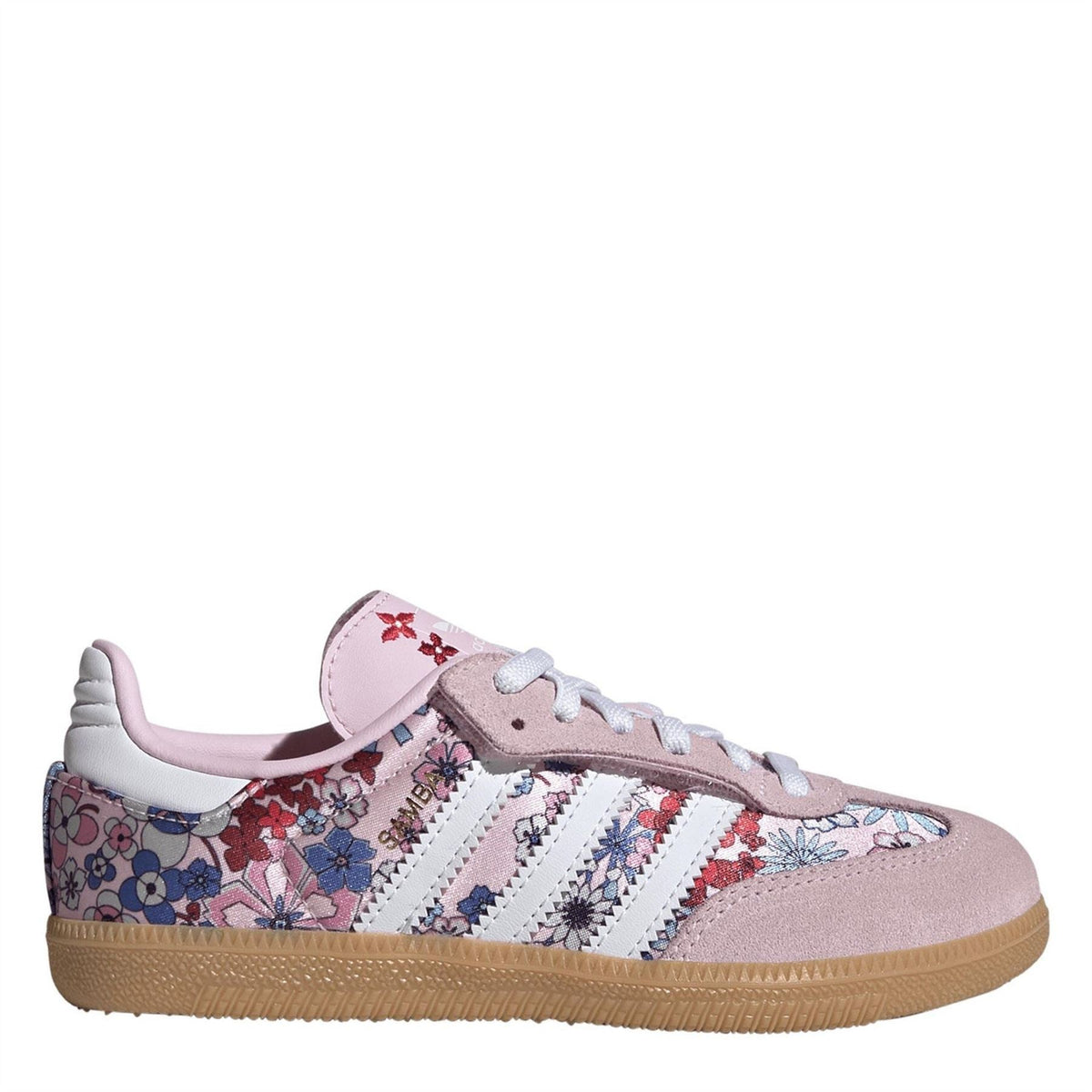 Floral suede low-top sneakers with white Adidas stripes, lace-up, gum sole.