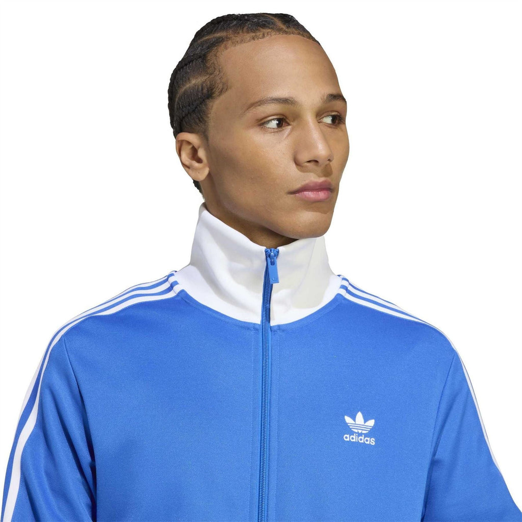 adidas Originals Adicolor Classics track top in vibrant color, showcasing a stylish, fitted design with iconic branding and sporty look.