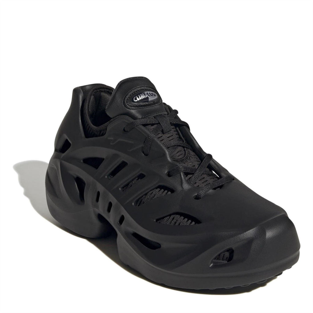 adidas Adifom low-top sneakers in black, three-quarter view, lace-up closure