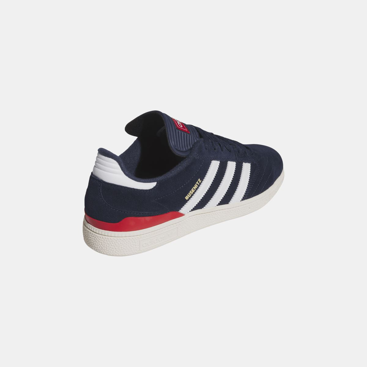 Navy Busenitz sneakers heel side view with white midsole and red stripe