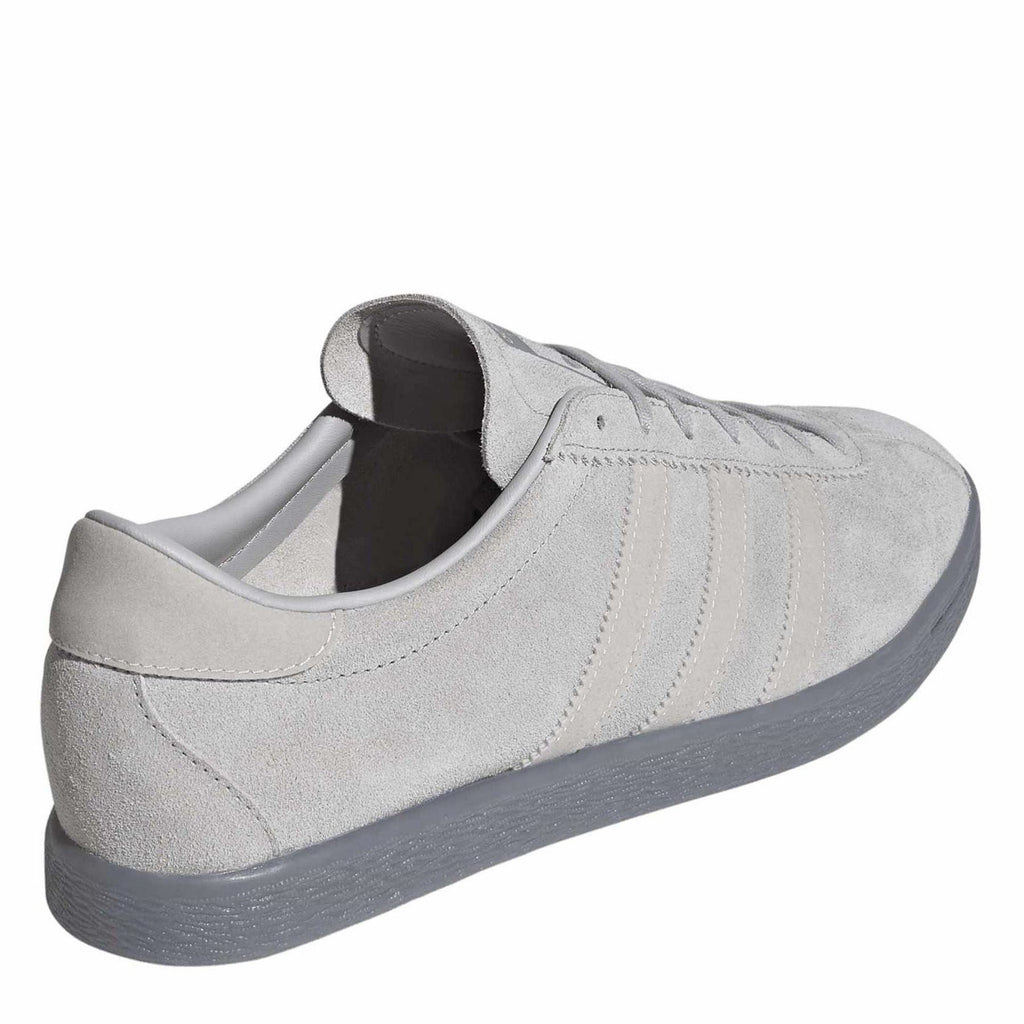 Adidas Originals light grey trainers, rear side view with suede upper and padded collar