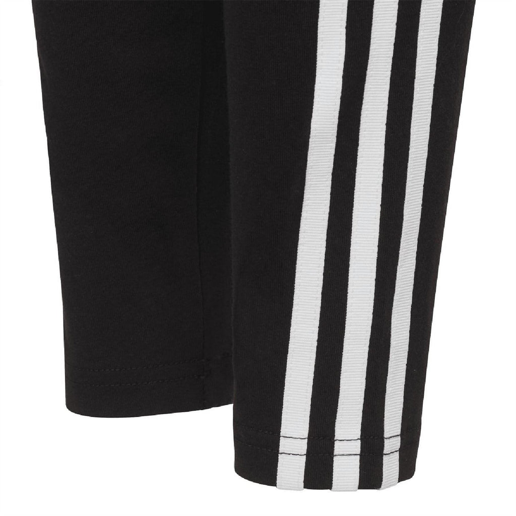 Black leggings with wide white side stripe panels from thigh to hem