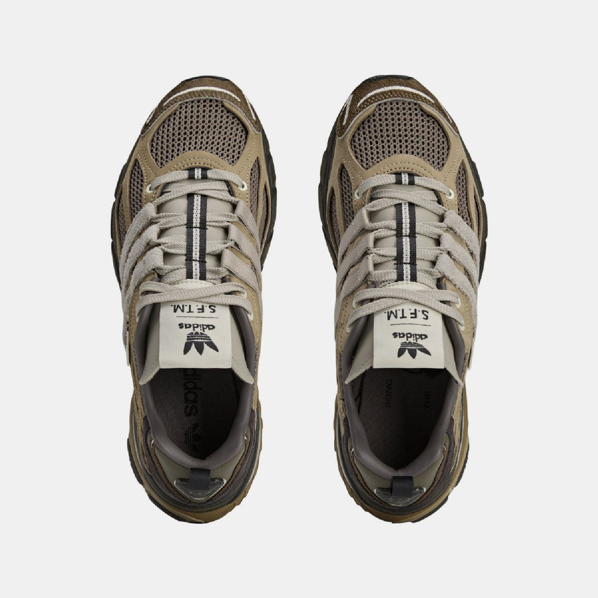 adidas Originals Adistar Cushion STFM trainers featuring a sleek design, cushioned sole, and stylish athletic footwear for active wear