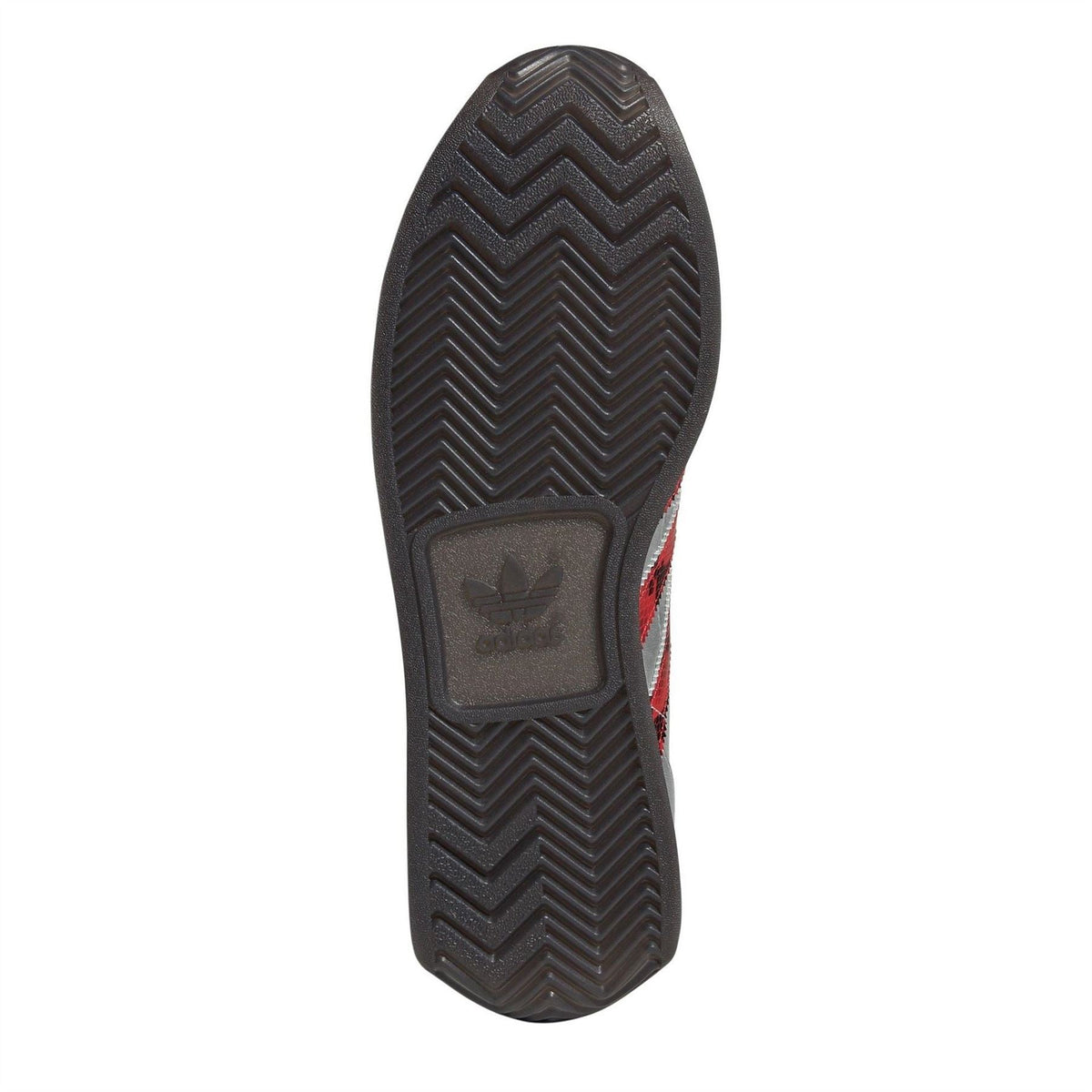 Rubber outsole of silver adidas Originals sneaker with zigzag tread