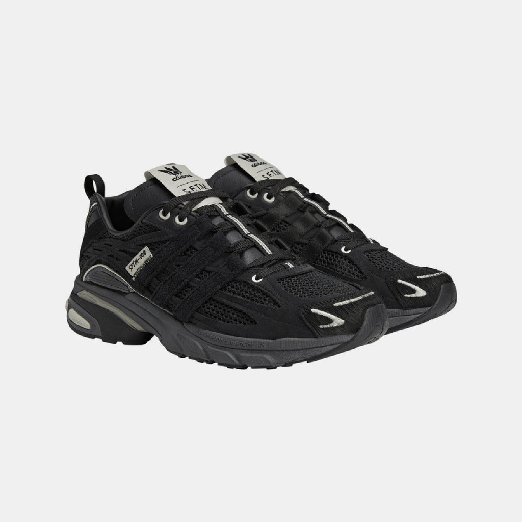 adidas Originals Adistar Cushion STFM trainers, sporty footwear with cushioned soles and stylish design, on a neutral background