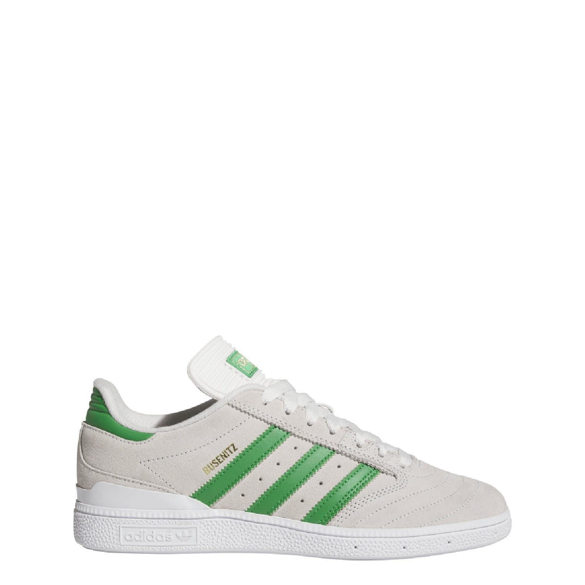 White low-top sneakers with green side stripes and padded collar.
