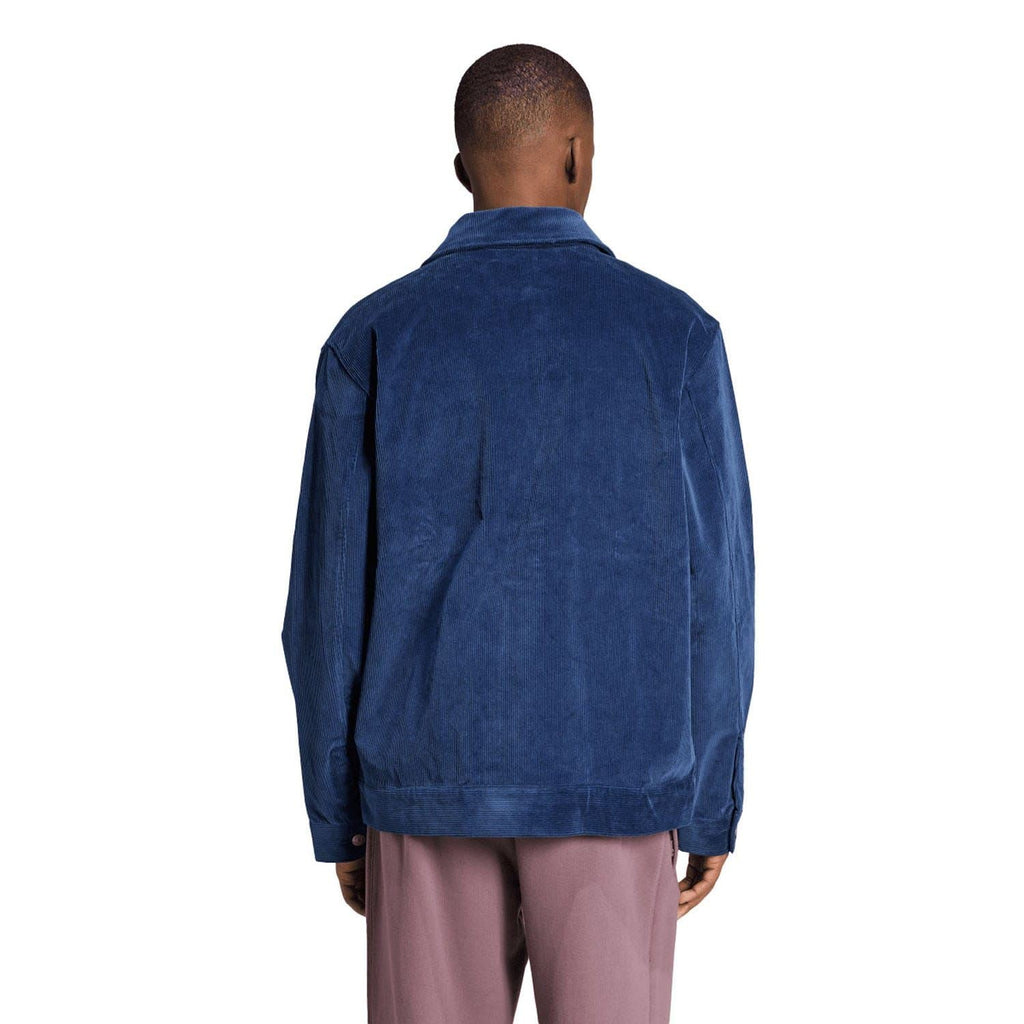 Indigo coach overshirt, back view with button closure