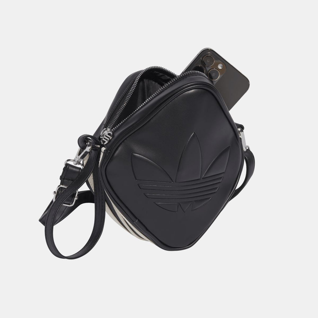 Men's adidas Originals diamond-shaped bag with adjustable strap and multiple compartments, made of durable fabric.