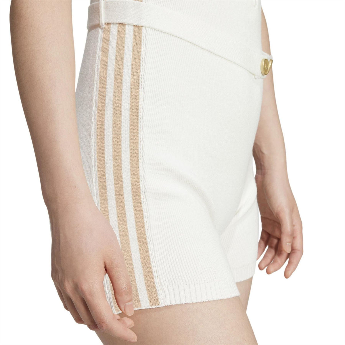 Off-white shorts romper panel with vertical beige stripe trim and ribbed hem