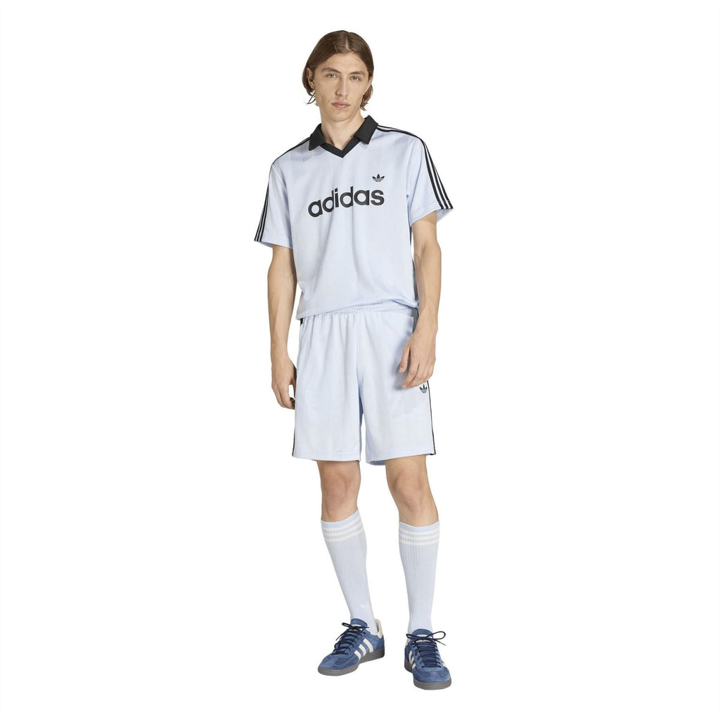Light blue adidas polo shirt with black collar and logo, worn with matching shorts