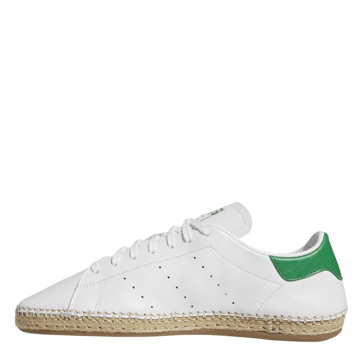 White leather low-top trainers with green collar accent, lace-up with perforated toe