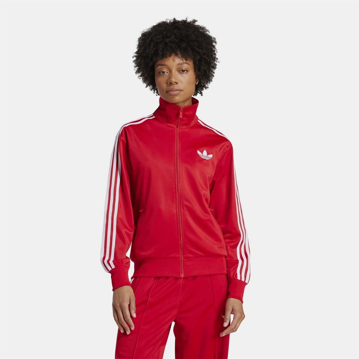 adidas Originals Classic Firebird loose track top sweatshirt in black with iconic embroidered logo and ribbed cuffs