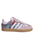 Pink suede Samba OG-style sneaker with white stripes, floral print, and gum sole.
