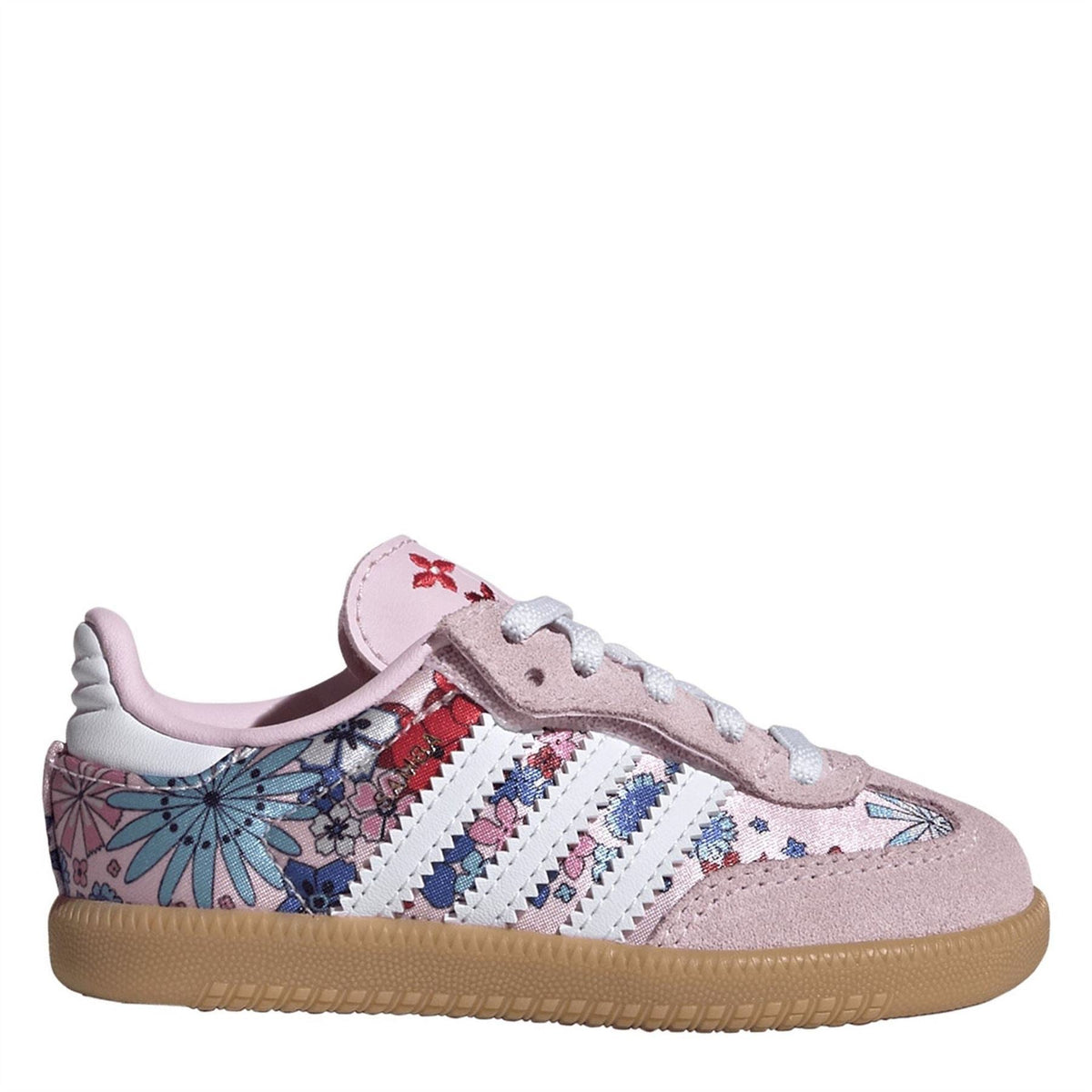 Pink suede Samba OG-style sneaker with white stripes, floral print, and gum sole.