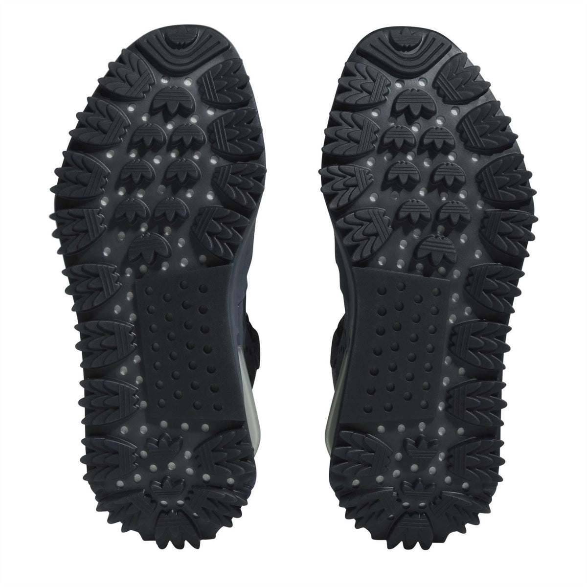 Altered Blue sneaker outsole view with deep tread and textured traction nubs