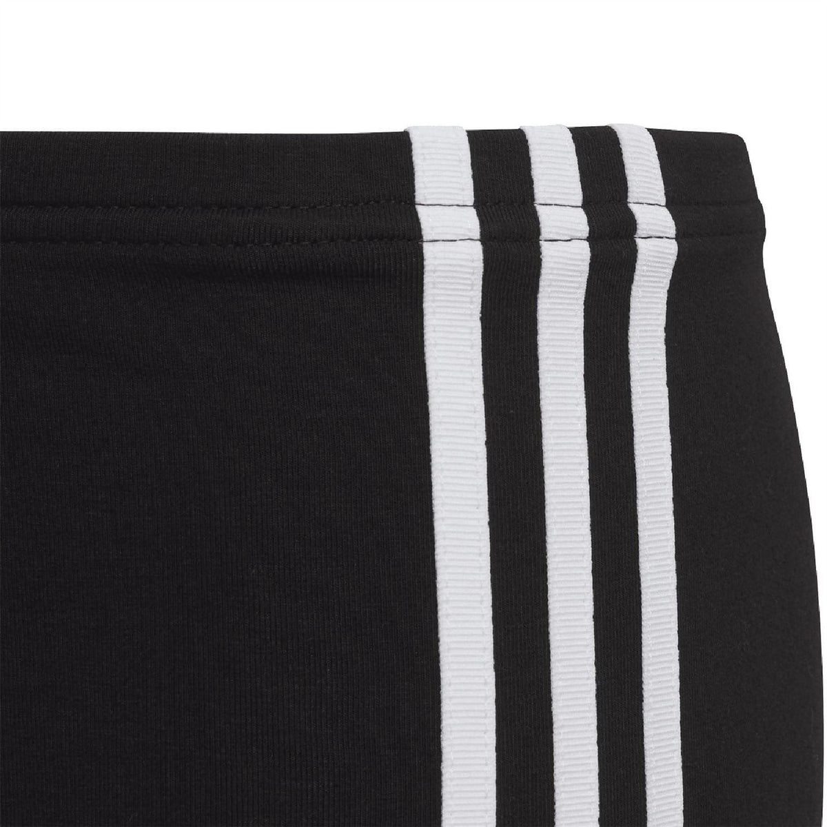 Black adidas leggings with three vertical white stripes on waistband and leg